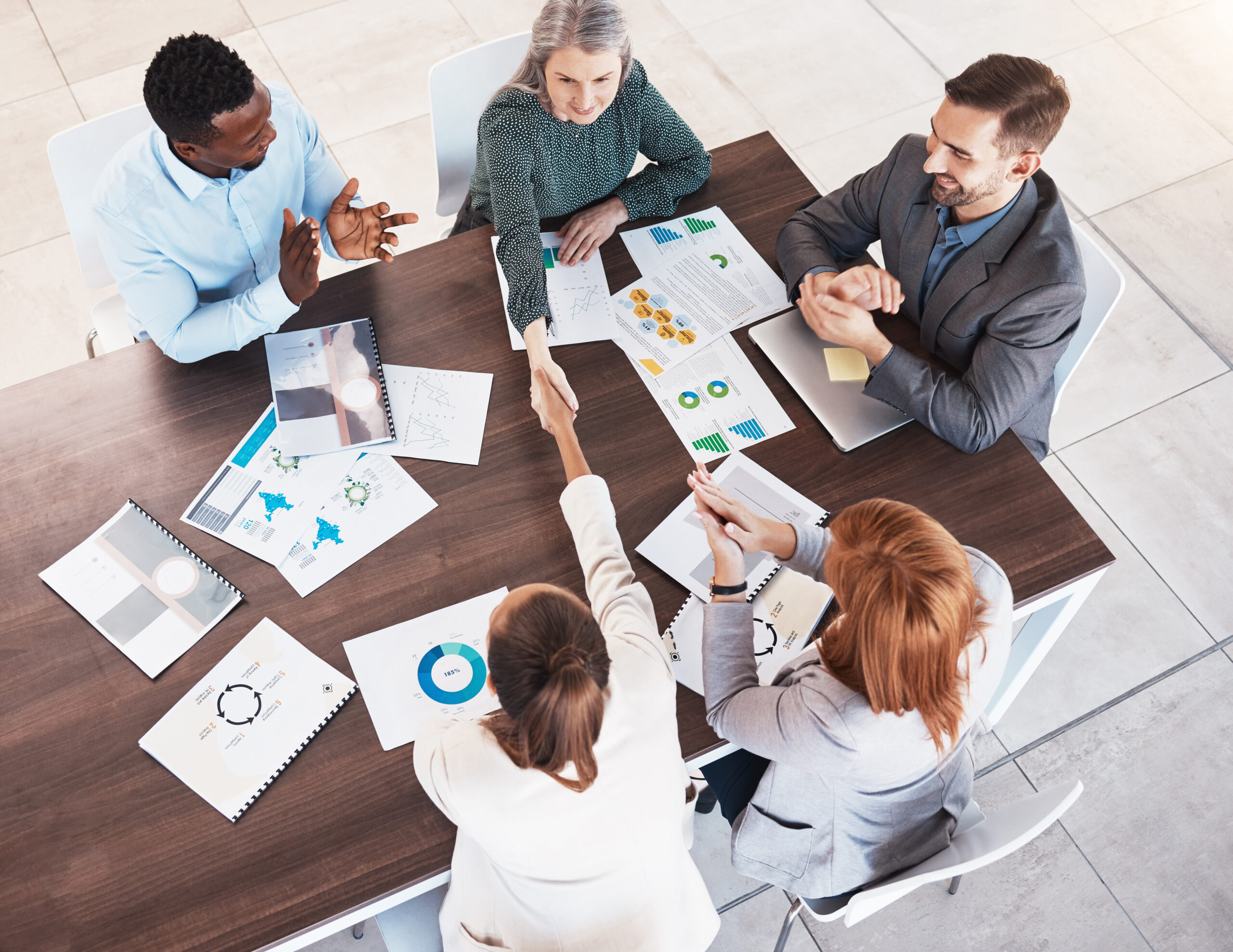 Business handshake, partnership and contract agreement of corporate clients in a meeting room. Crm,.