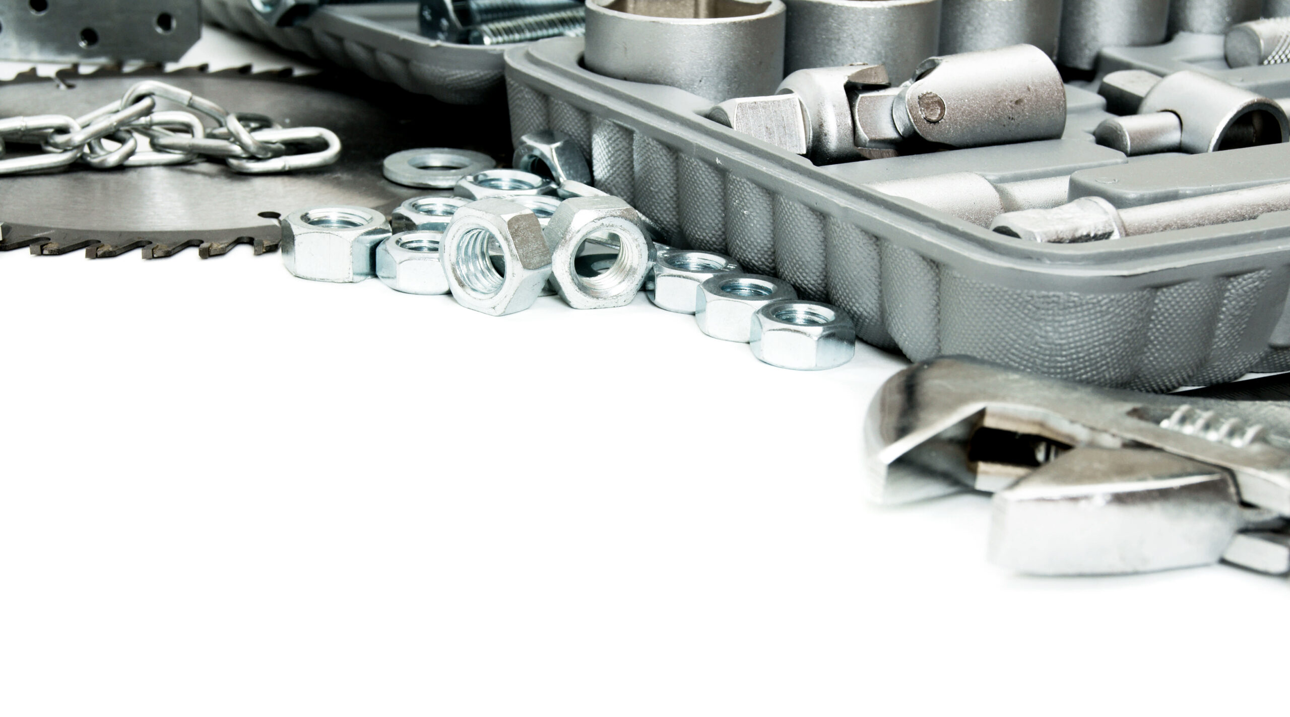 Metal working tools. Metalwork. Box, saw, spanner and others tools on white background.